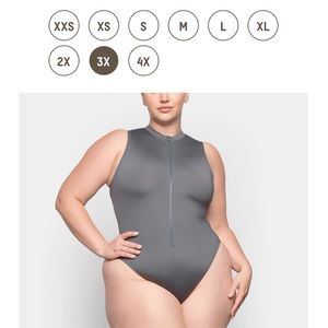 Skims swim in gunmetal. Size 3x. Was too big for me. Perfect for size 18-20. NWT